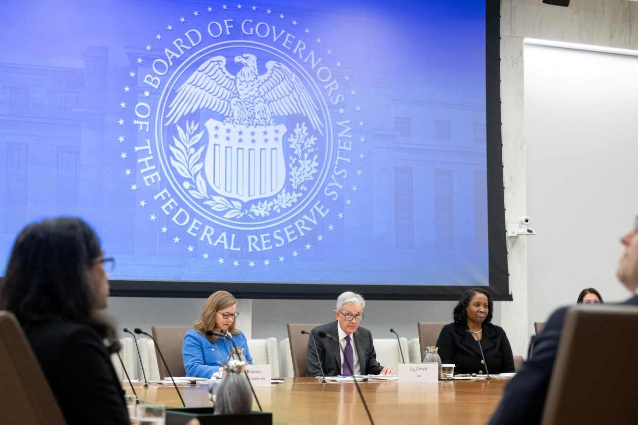 Federal Reserve Chair Jerome Powell (center) speaks alongside Michelle Bowman (left), vice chair for supervision, and Lisa Cook (right), board governor, at Federal Reserve Board meeting in Washington on June 25.