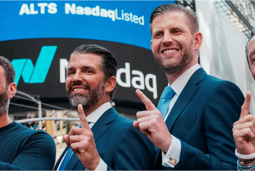 Donald Trump Jr. and Eric Trump gesture outside the Nasdaq building after ringing the opening bell to celebrate the closing of ALT5’s $1.5 billion offering and adoption of its $WLFI Treasury Strategy at the Nasdaq Market, in New York City, U.S., August 13, 2025.