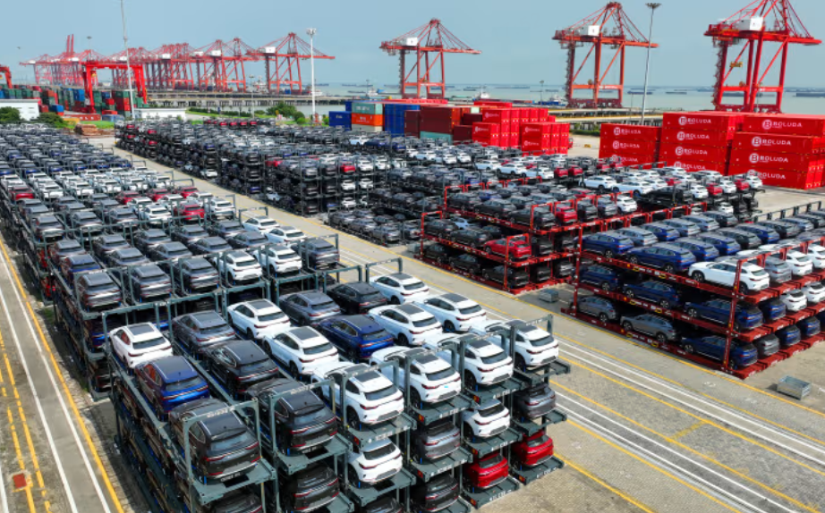 The Biden administration is hitting Chinese electric vehicles with new tariffs. In this photo, EVs waiting to be loaded on a ship are stacked at a port in China’s Jiangsu province last year.