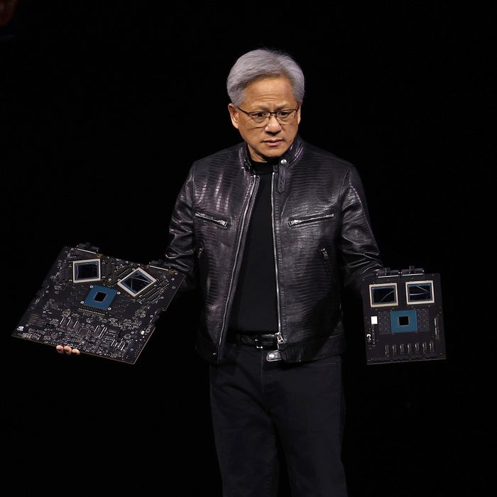Huang shows off Nvidia’s latest GPUs earlier this year. His company is now worth more than $2 trillion.  PHOTO: JUSTIN SULLIVAN/GETTY IMAGES