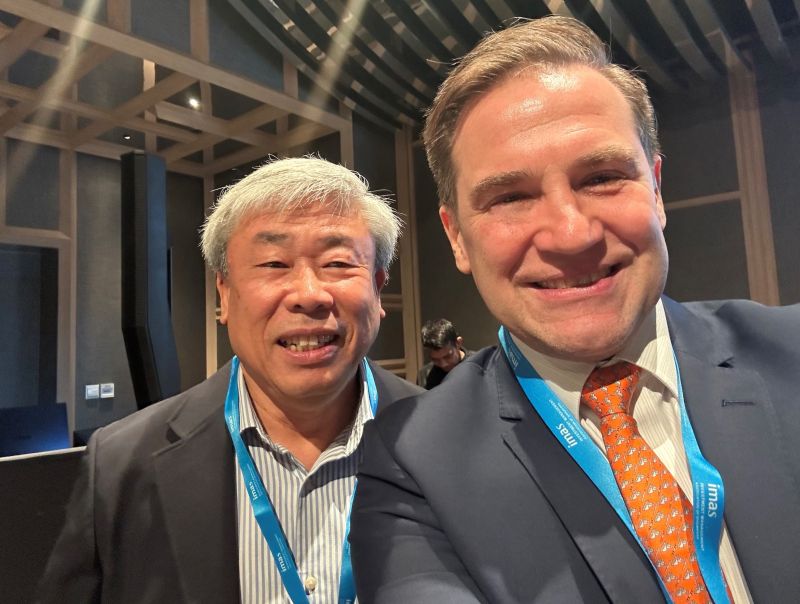 Executive Director Dennis Au & Geoff Howie: