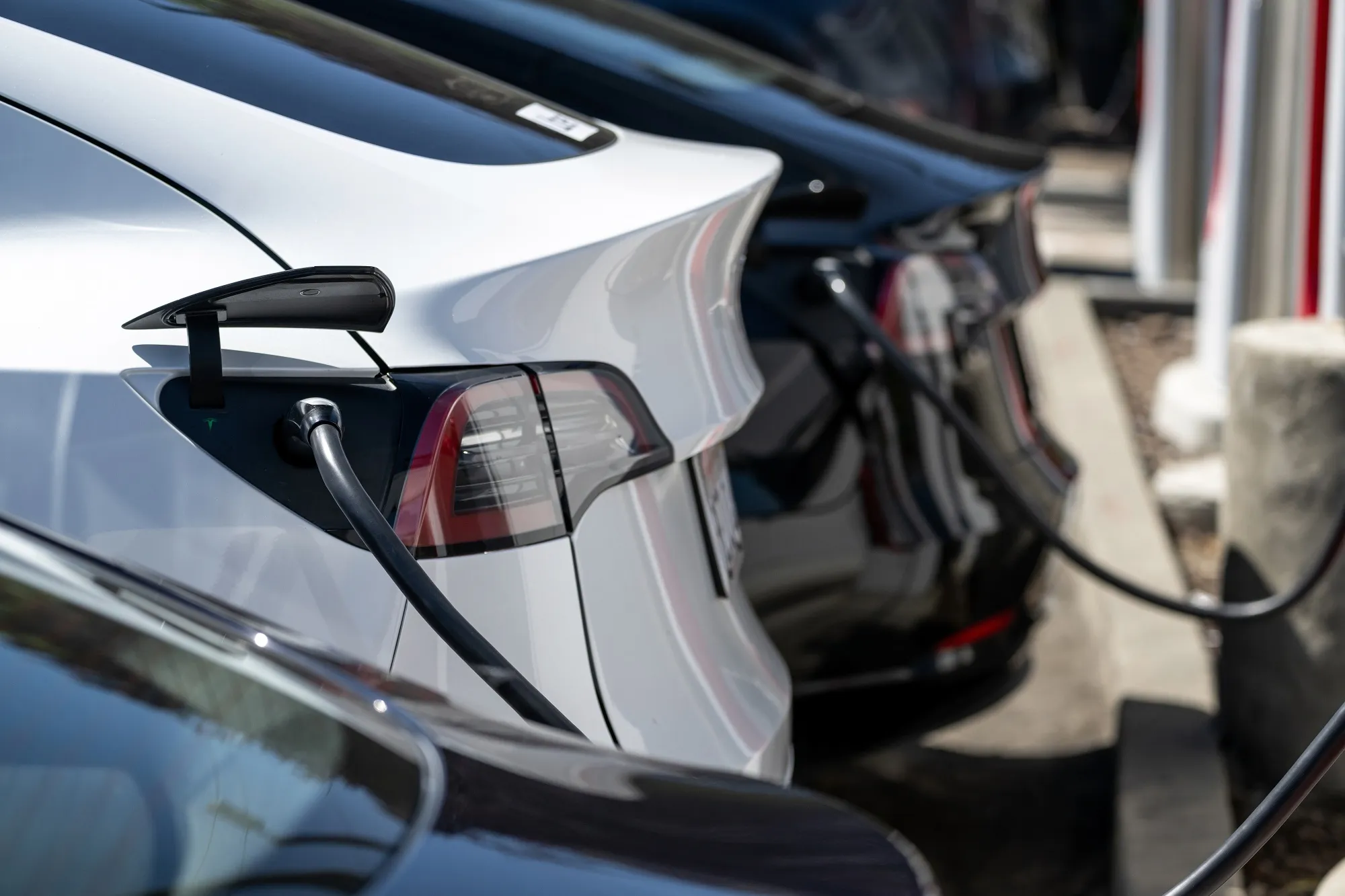 Tesla electric vehicles at a recharging station in Albany, California.