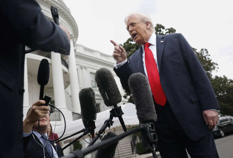 President Trump addressing reporters outside the White House.
