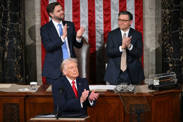 US President Donald Trump applauds as US veteran Captain E. Royce Williams receives the Medal of Honor during the State of the Union address in the House Chamber of the US Capitol in Washington, DC, on February 24, 2026.