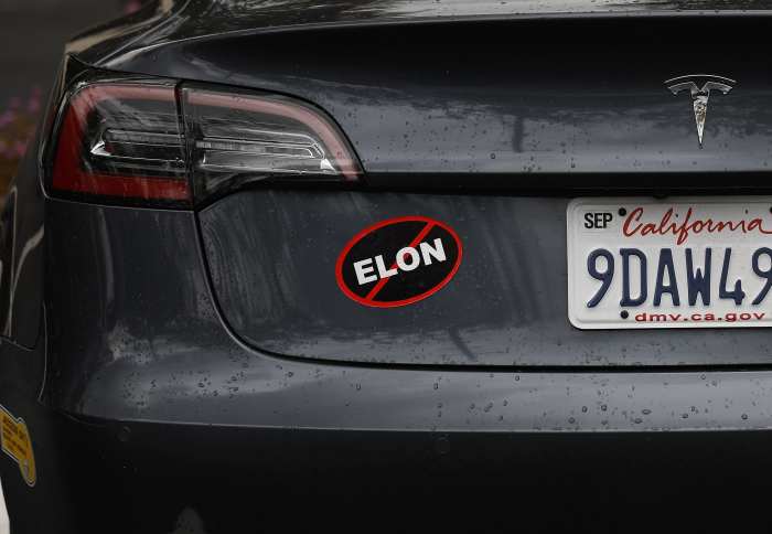 A bumper sticker protesting Tesla CEO Elon Musk on a Tesla vehicle in California.Photo: Getty Images