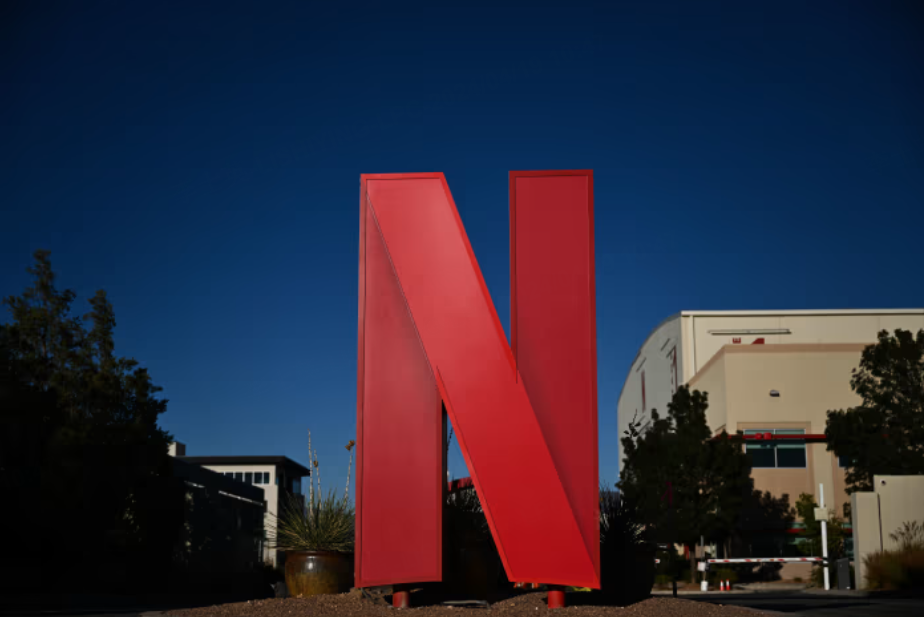 Netflix beat subscriber estimates on Thursday but disappointed with its sales outlook and a planned change to earnings reports.