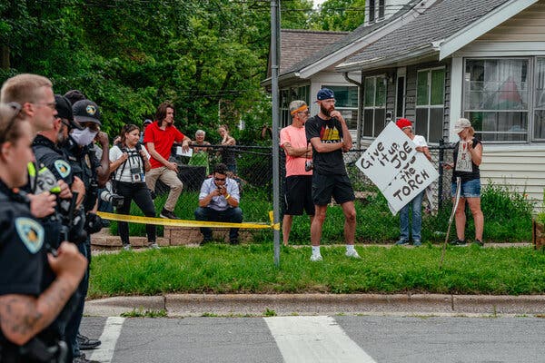 Protesters near the site of a Biden campaign stop this month in Madison, Wis.