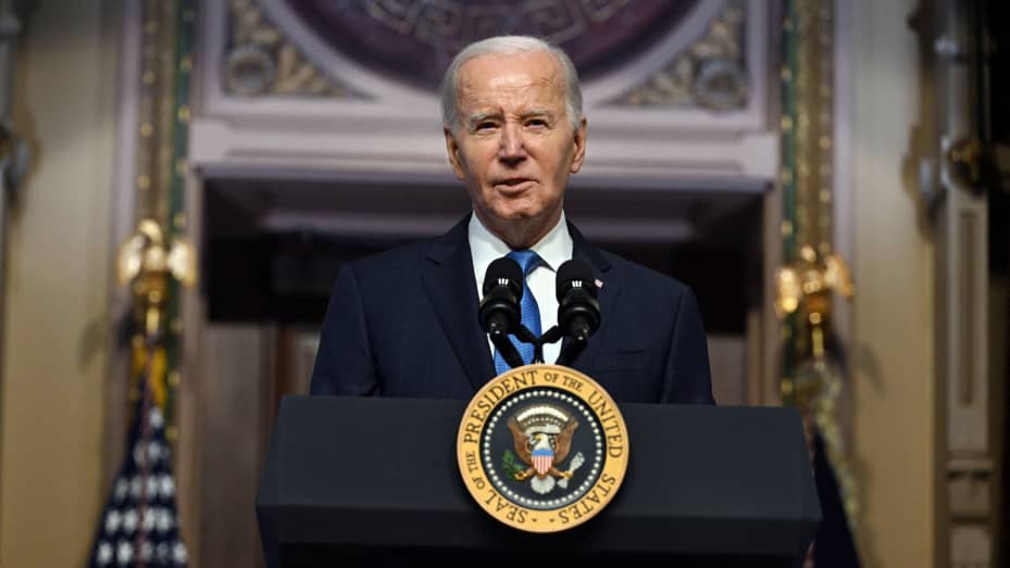 US President Joe Biden speaks at a meeting of the National Infrastructure Advisory Council, in the Indian Treaty Room of the White House in Washington, DC, on December 13, 2023.